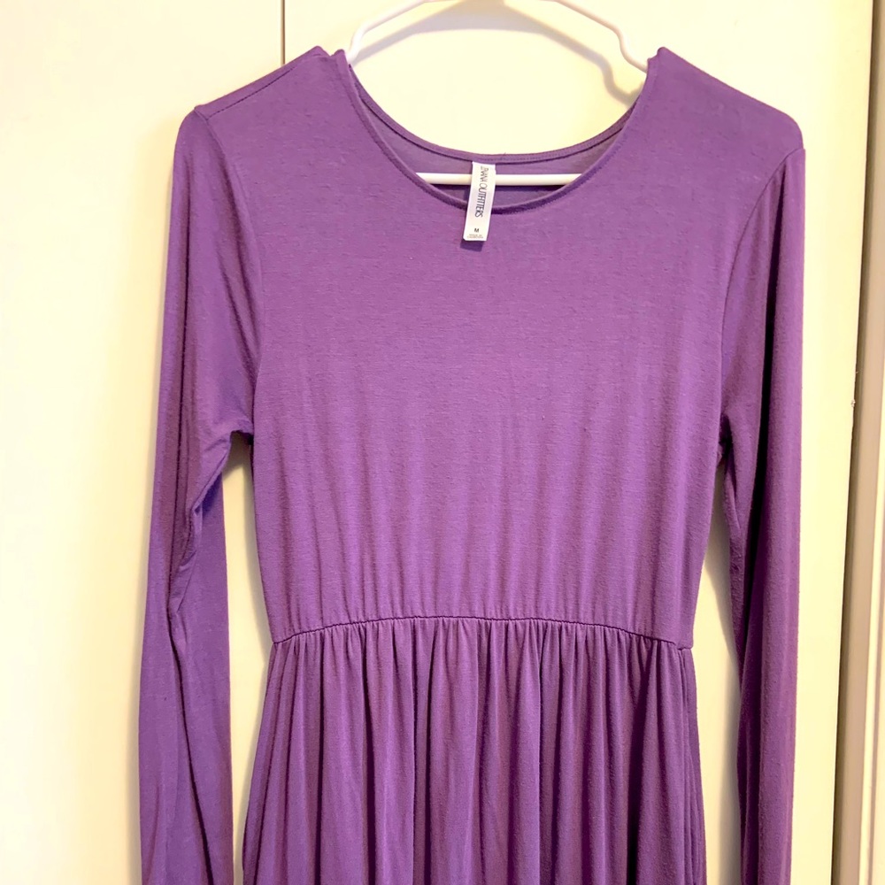 This purple maxi dress is medium size, has pockets, great for maternity.